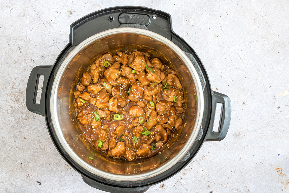 sesame chicken with scallions inside the instant pot.