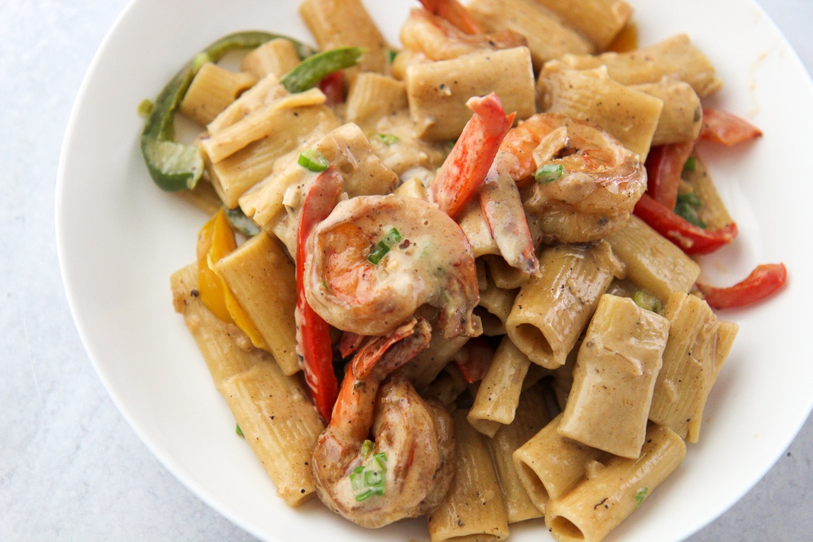 rasta pasta in a white plate.