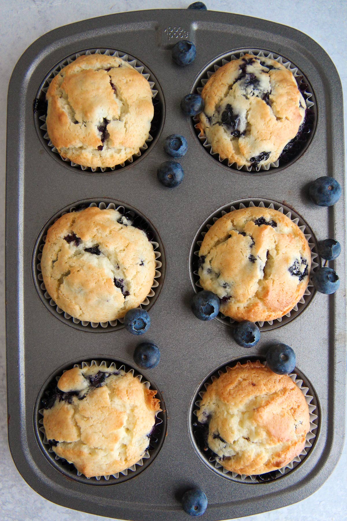 a muffin pan filled with 6 muffins.