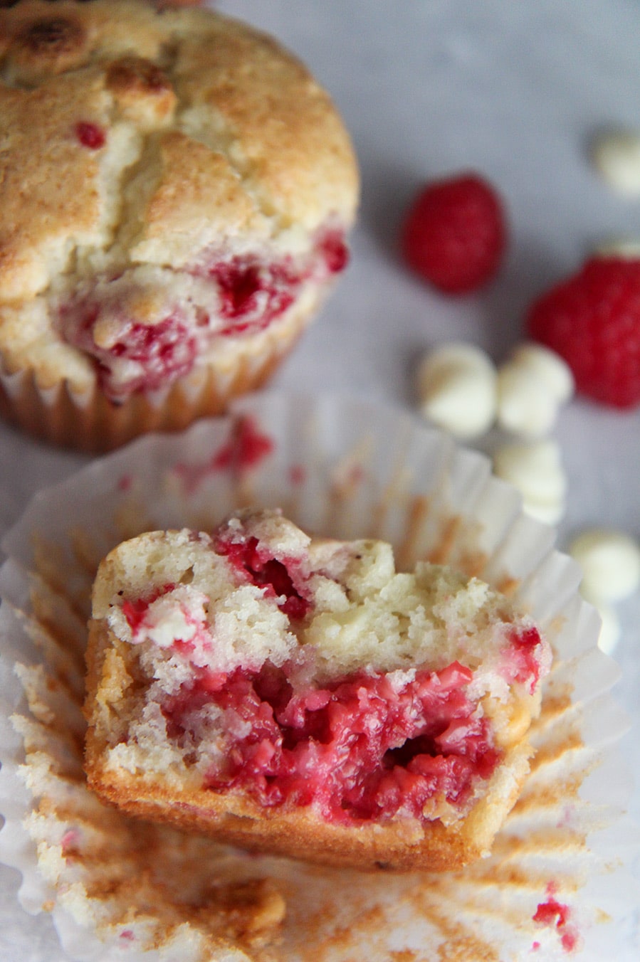 a muffin sliced in half up close. 