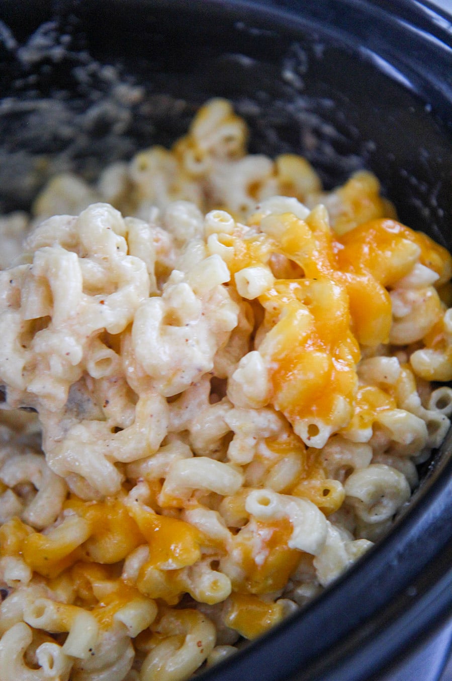 creamy macaroni and cheese cooked in the slow cooker. 