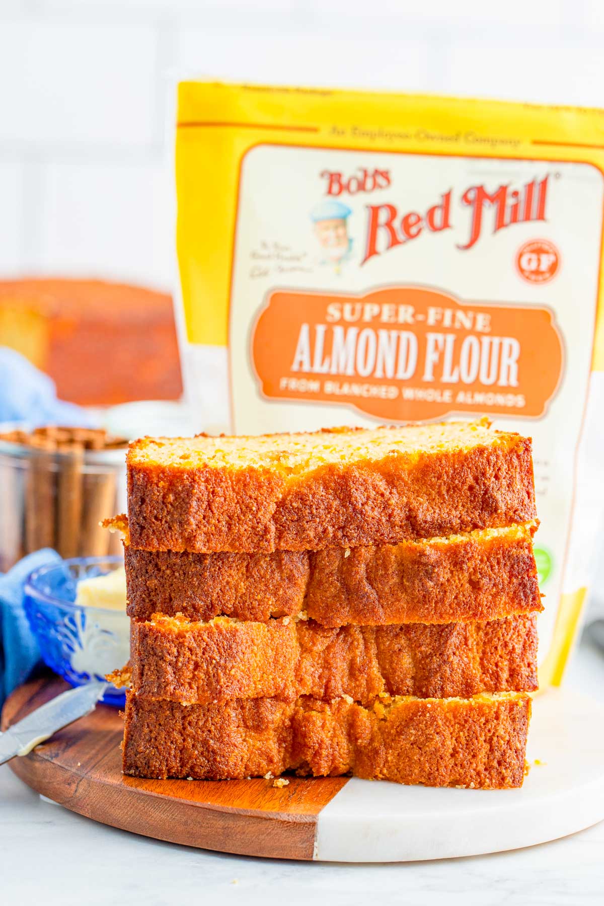 4 slices of gluten free sweet potato bread and a bobs red mill package in the background. 