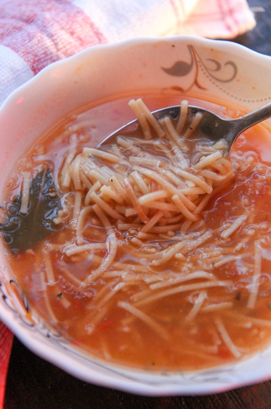Mexican noodle soup with a spoon.