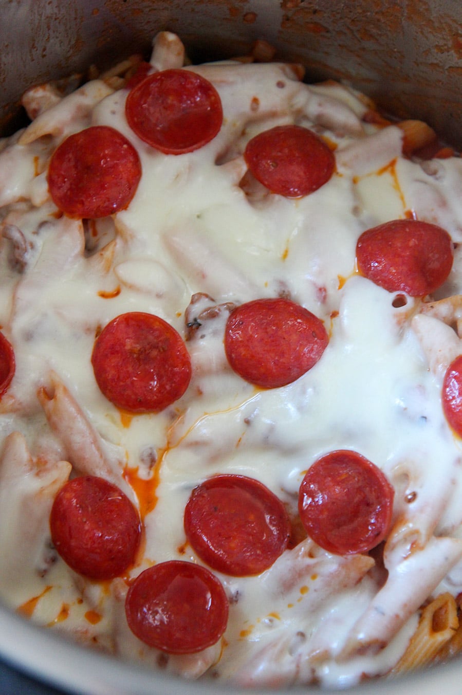 pizza pasta with mozzarella cheese and pepperoni