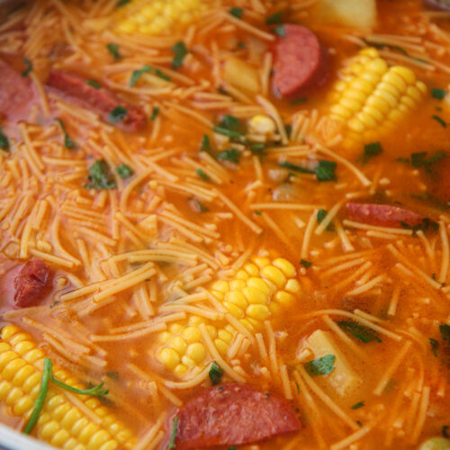 sopa de salchichon in a large pot.