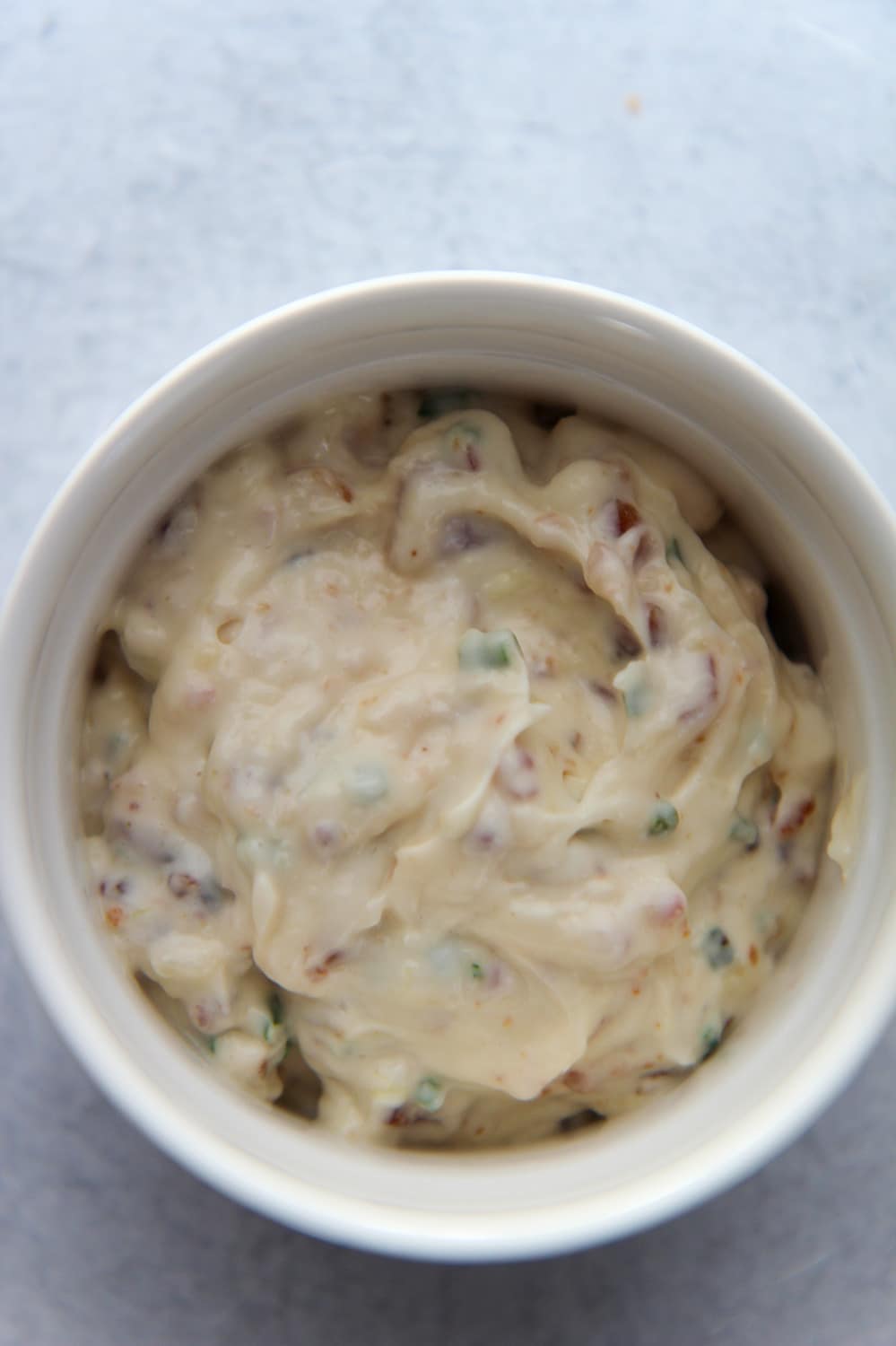 bacon aioli in a white ramekin 