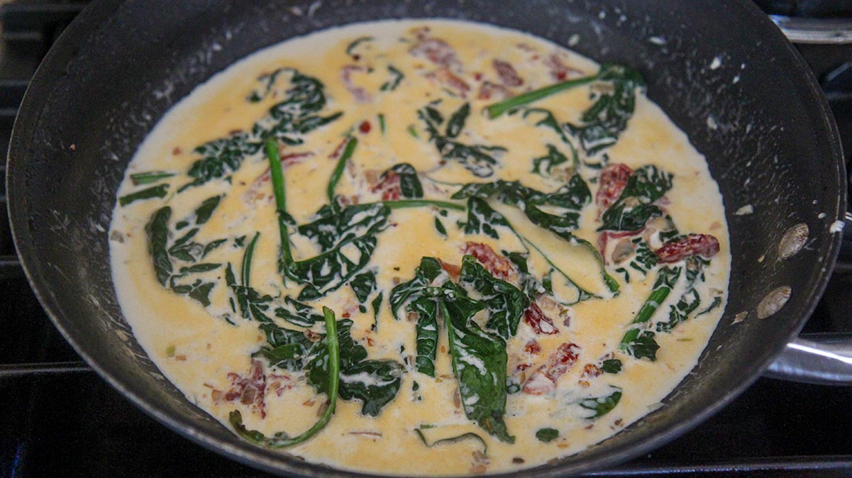 cream and spinach in a skillet. 