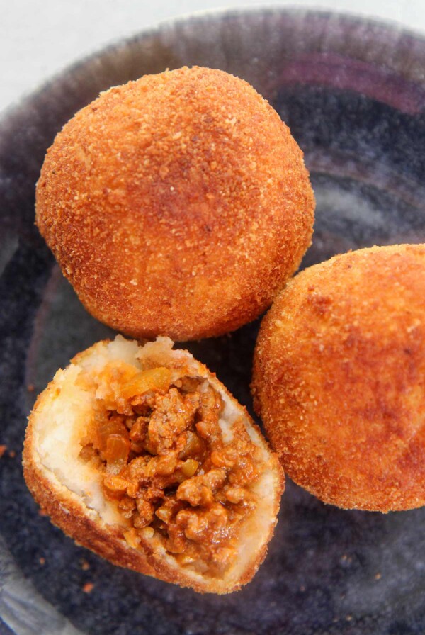 the inside of a papa rellena up close.