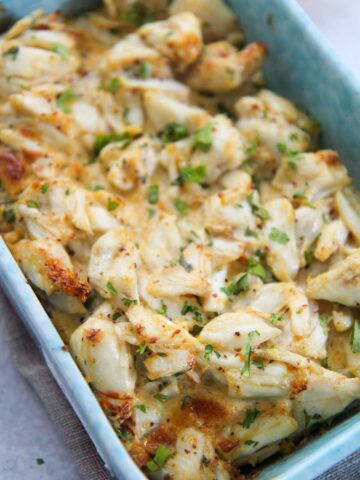 crab imperial in a blue baking dish.