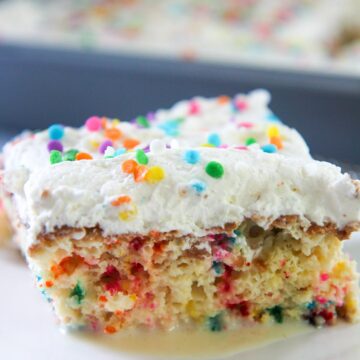 a slice of funfetti tres leches cake up close.