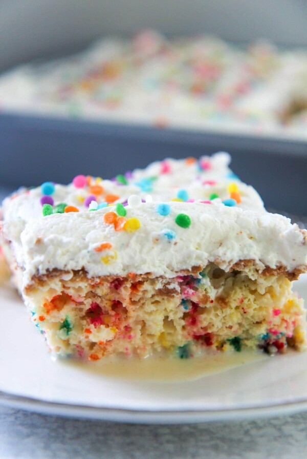 a slice of funfetti tres leches cake up close.