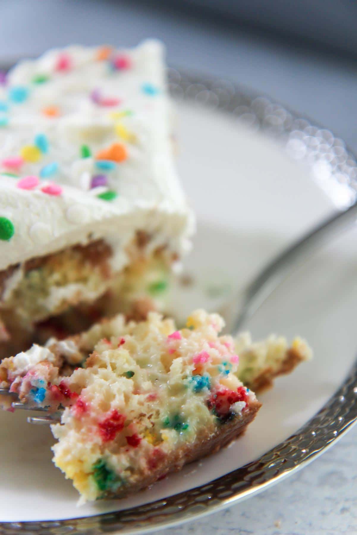 funfetti tres leches cake on a fork. 