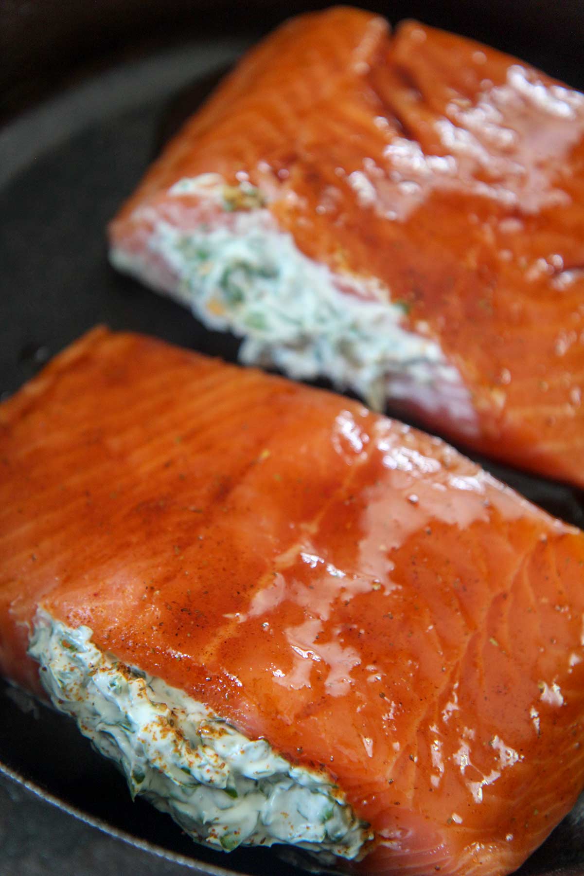 raw salmon filled with spinach and cream cheese. 