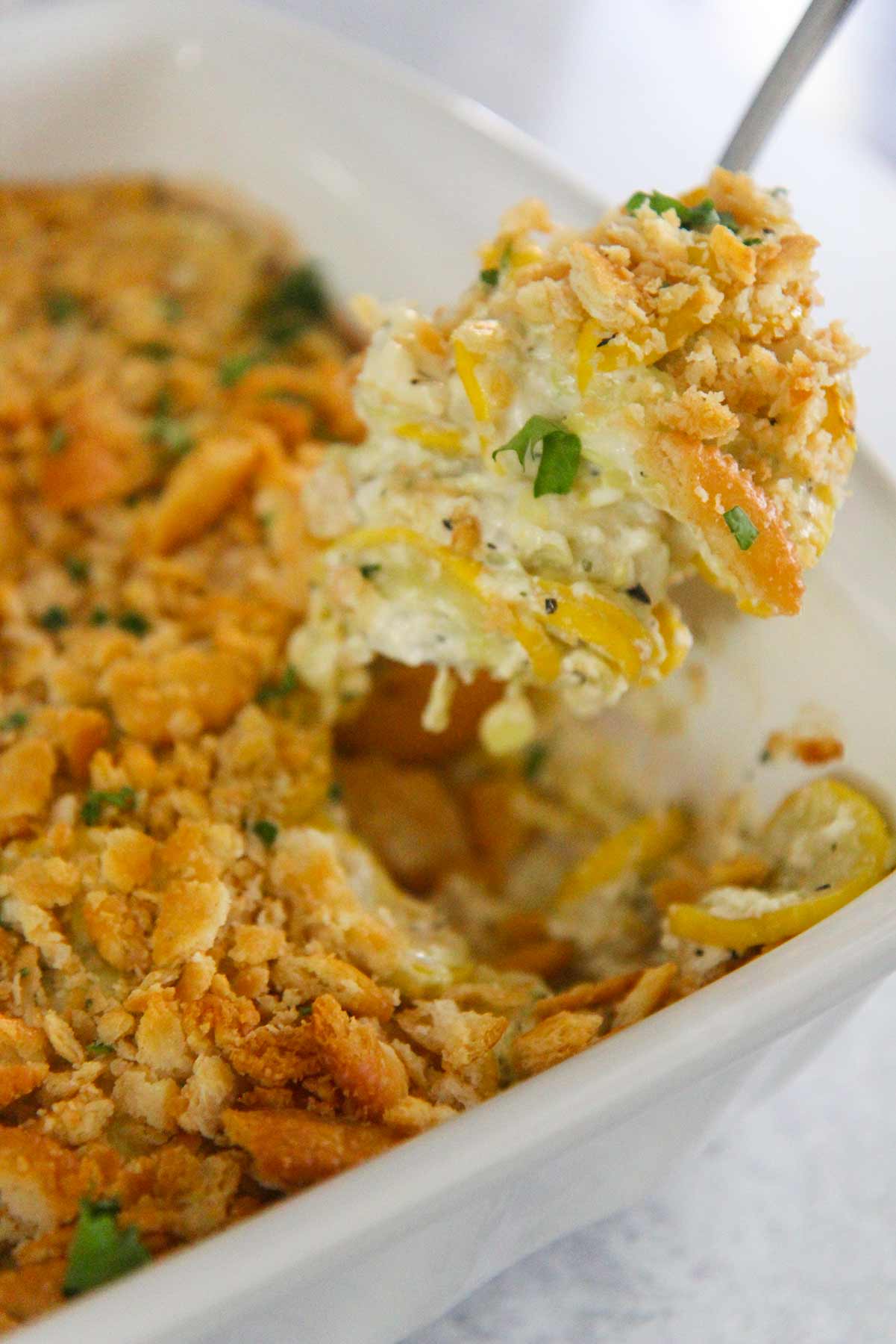A spoonful of Southern yellow squash casserole. 