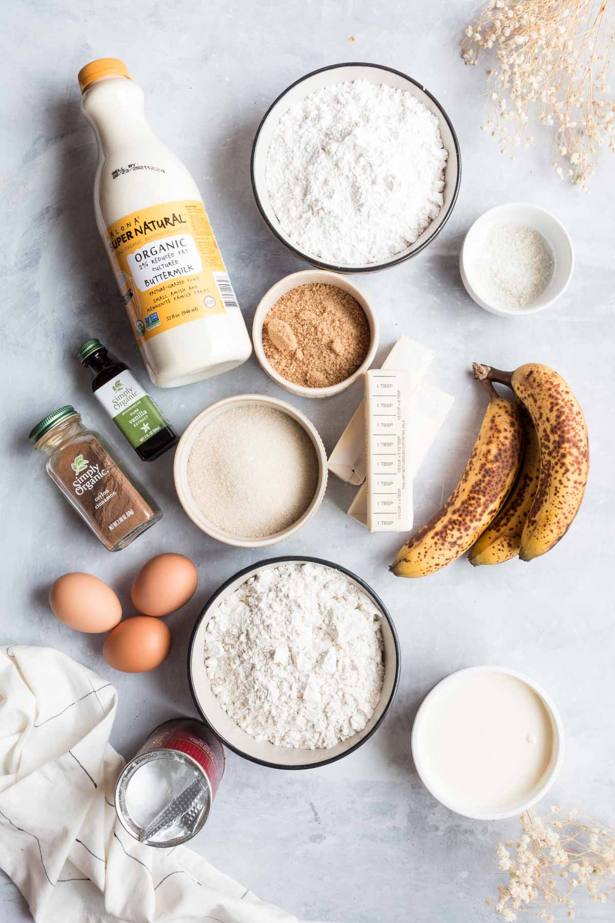 ingredients for banana cake and cream cheese frosting. 