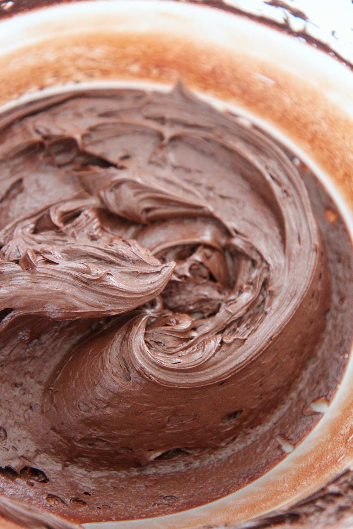 chocolate buttercream frosting in a bowl. 