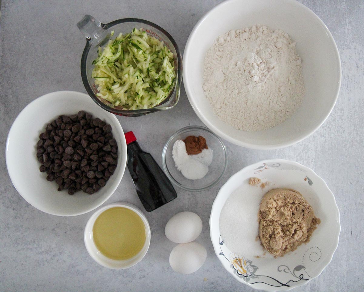 ingredients for zucchini chocolate chip muffins. 