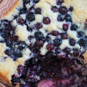 Southern blueberry cobbler in a 9x9 baking dish.