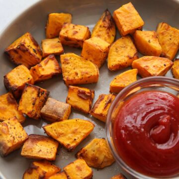 air fryer sweet potatoes with a side of ketchup.
