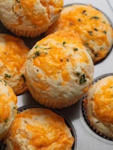 cheddar cheese and chive muffins up close.