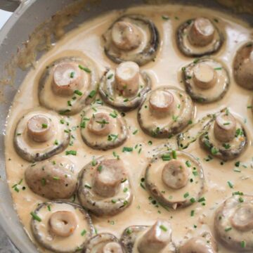 creamy garlic butter mushrooms in a skillet.