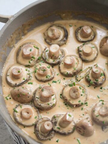 creamy garlic butter mushrooms in a skillet.