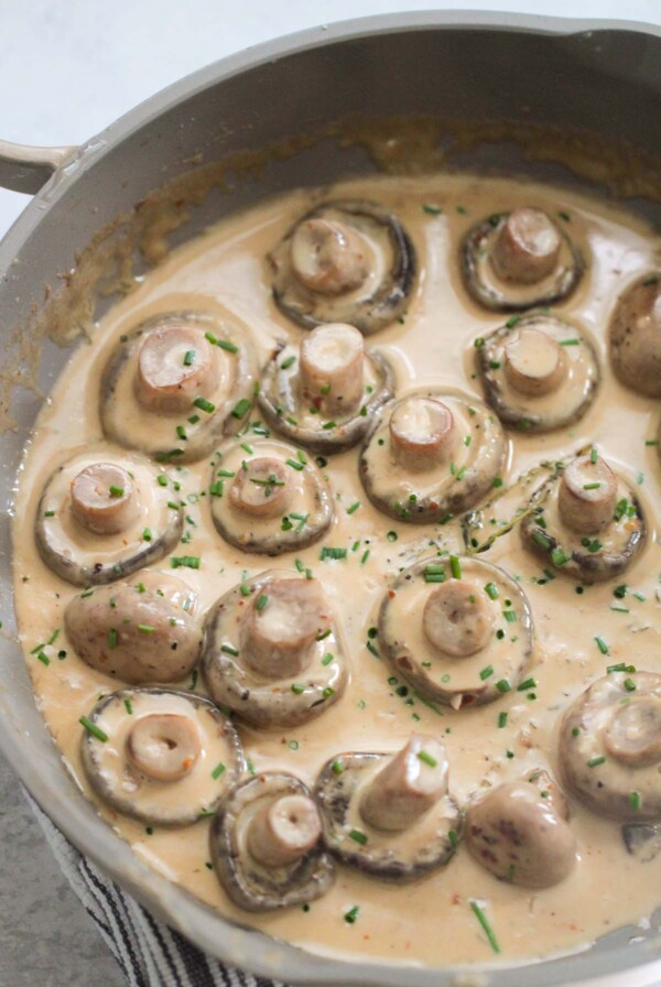 creamy garlic butter mushrooms in a skillet.