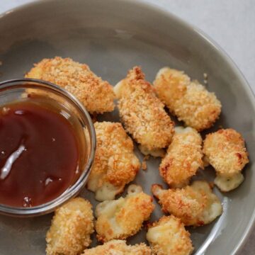 air fryer cheese curds with a side of caramel sauce.