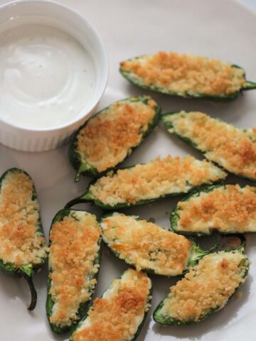 air fryer jalapeno poppers with a side of blue cheese dressing.