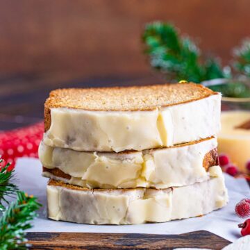 three eggnog bread slices stacked.