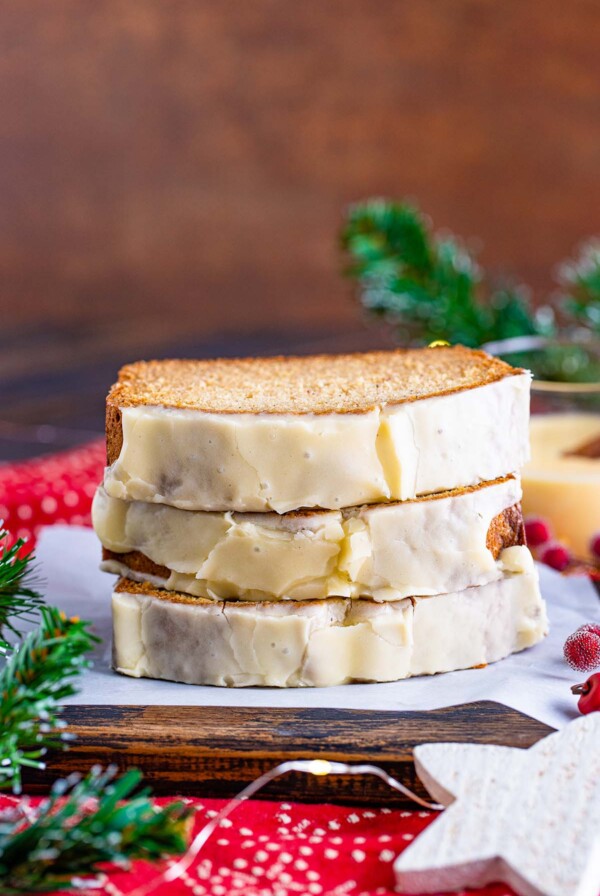 three eggnog bread slices stacked.
