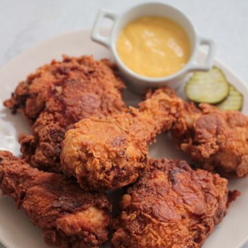 buttermilk fried chicken on a plate.