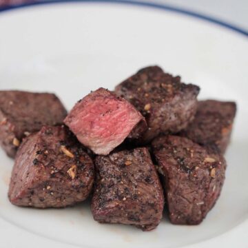 air fryer steak tips on a plate.