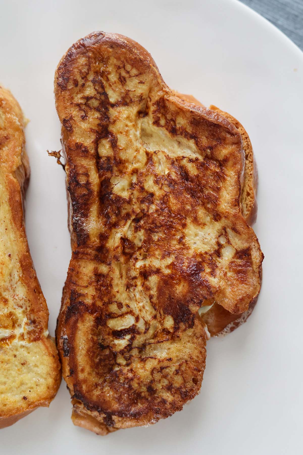 golden brown stuffed french toast up close. 