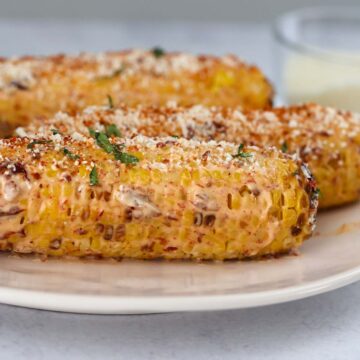 air fryer Mexican corn on a plate.