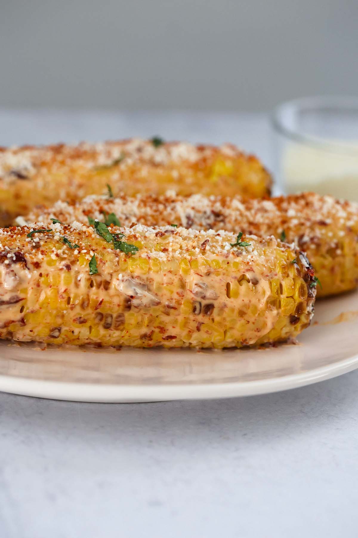 air fryer Mexican corn on a plate. 