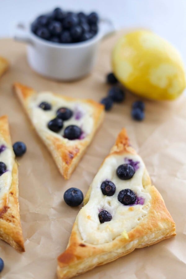 baked lemon blueberry danish on parchment paper.