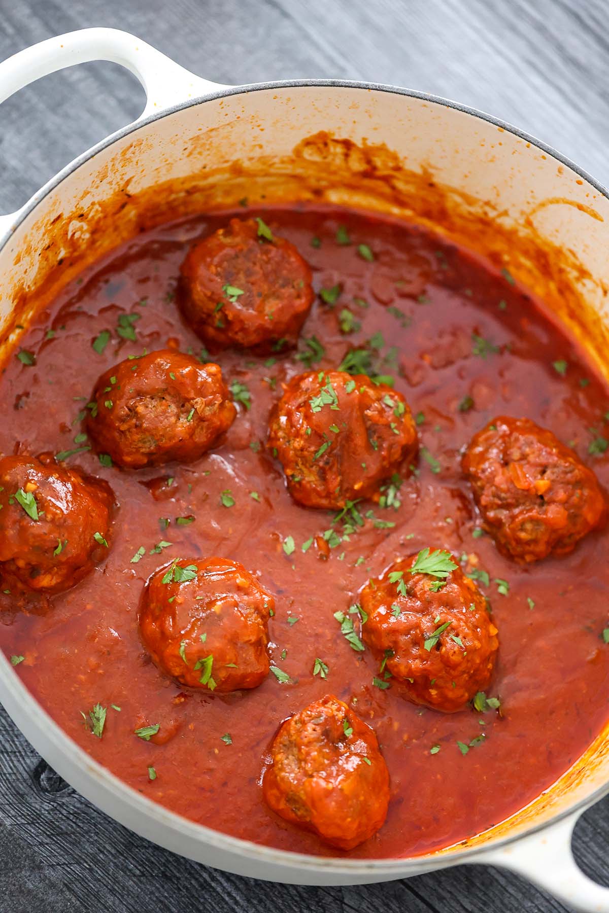 Albondigas with sauce in a dutch oven. 