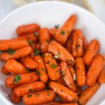 Air fryer honey carrots in a bowl.
