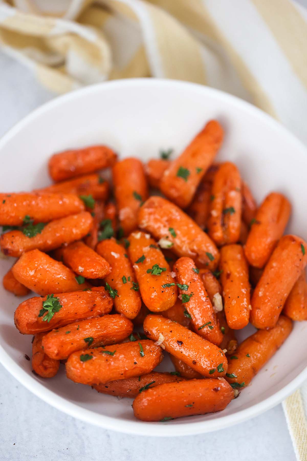 Air fryer honey carrots in a bowl. 