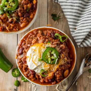 Crockpot chili in two small bowls.