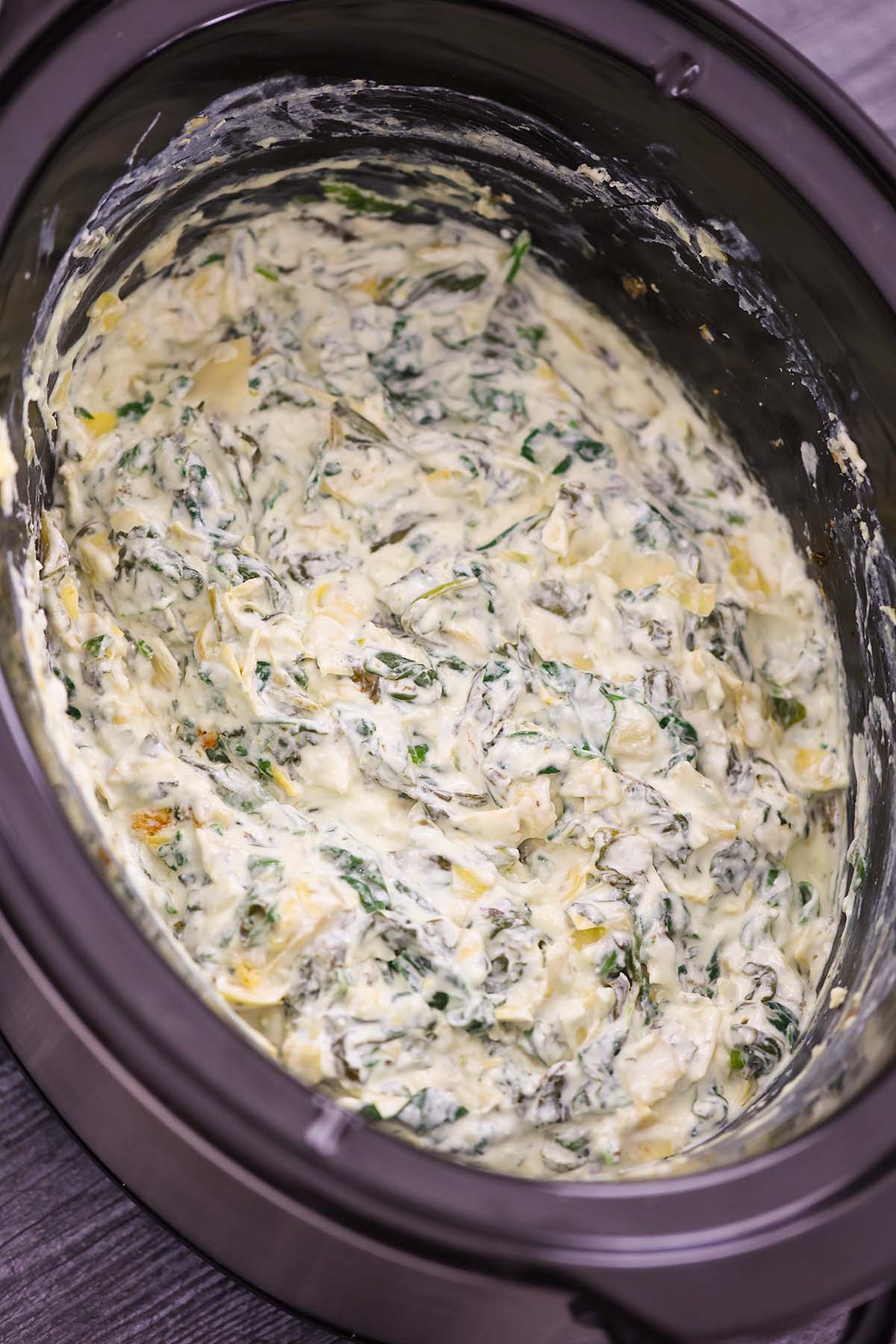 spinach artichoke dip in the slow cooker. 