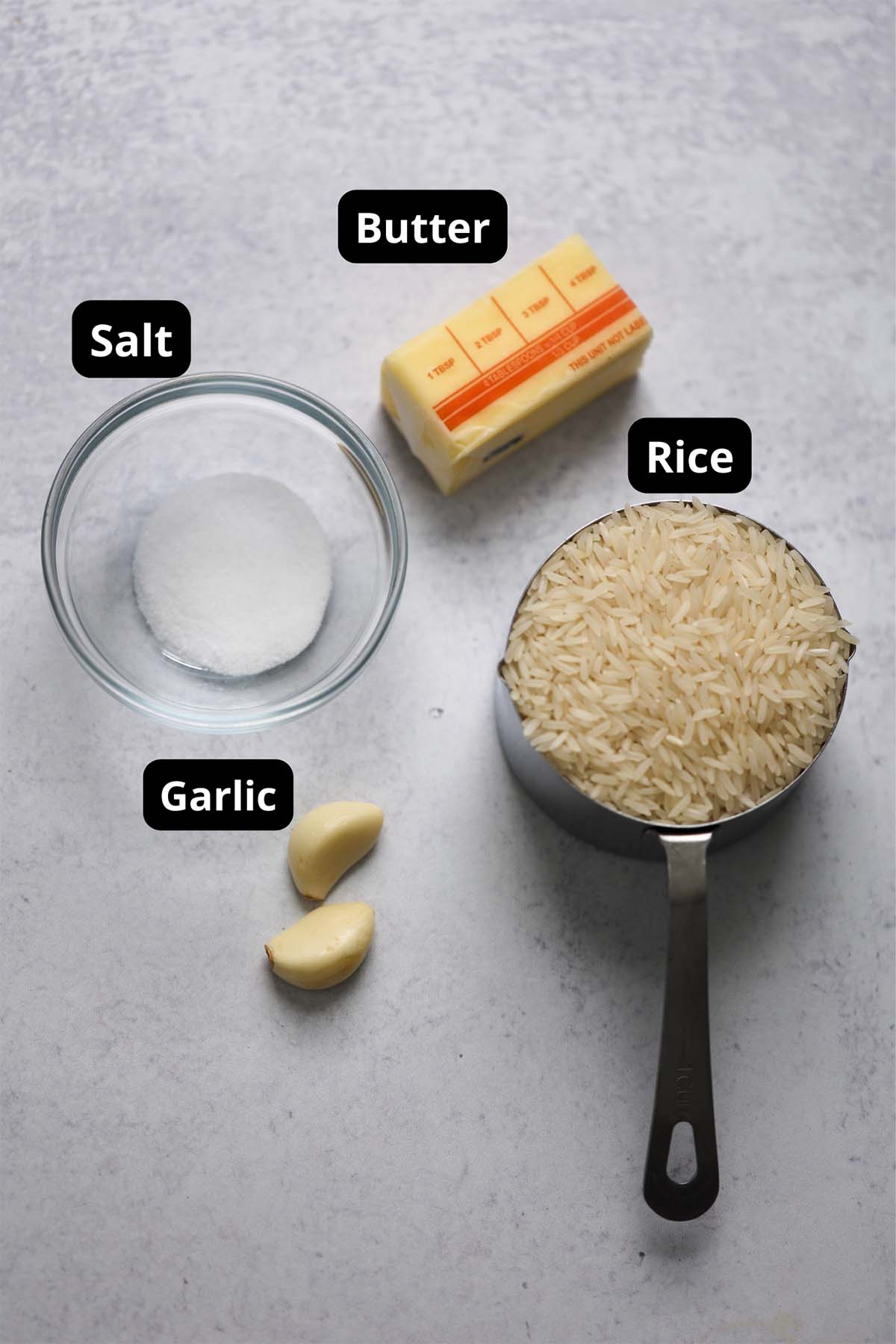 uncooked rice, butter, salt, and garlic. 
