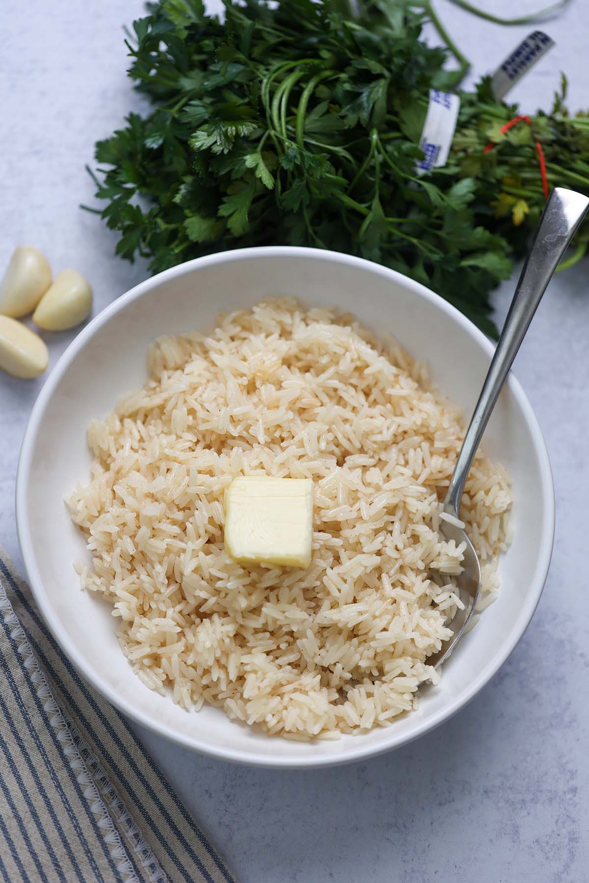Garlic butter rice with butter on top. 