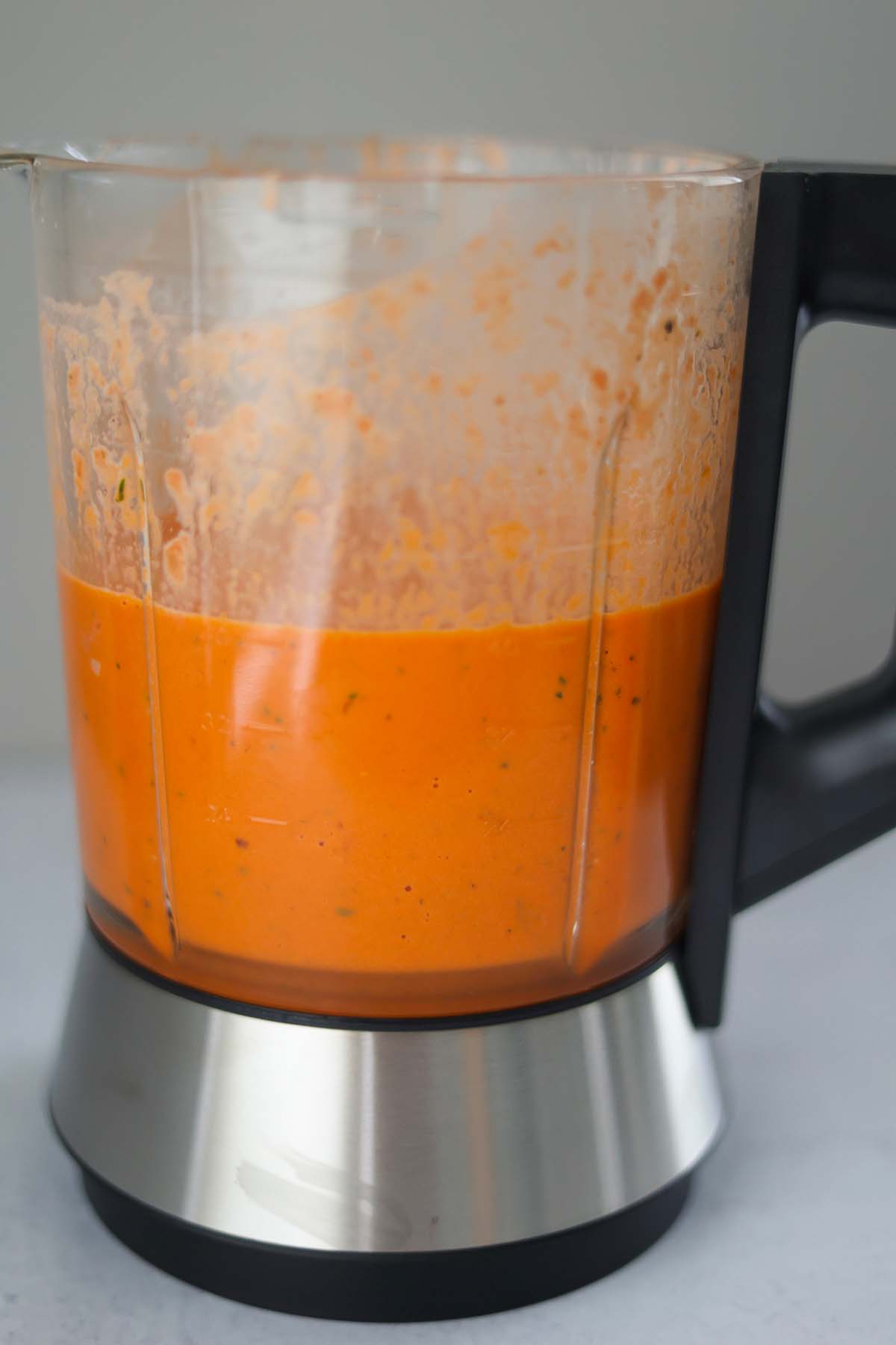 Creamy tomato vodka sauce in a blender. 