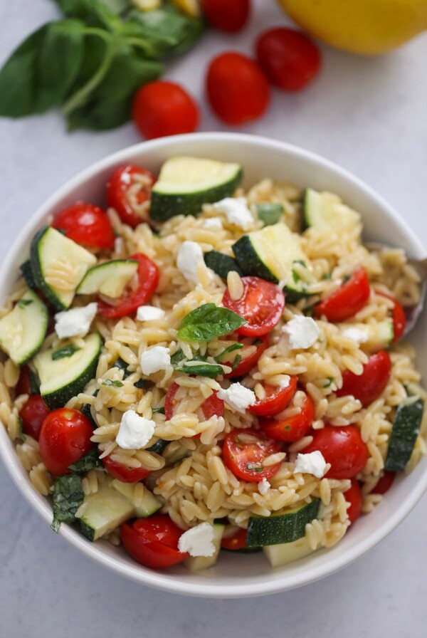 lemon orzo pasta salad in a white bowl.
