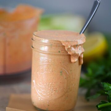 remoulade sauce in a mason jar with a spoon.