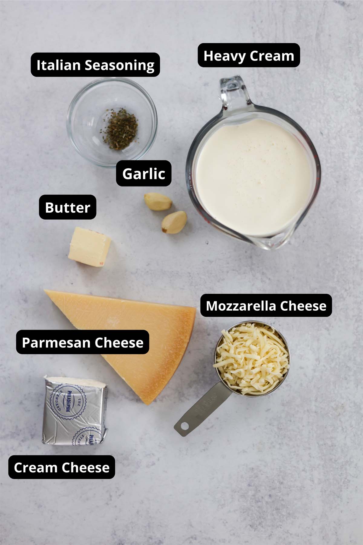 labeled and measured ingredients for Alfredo sauce. 