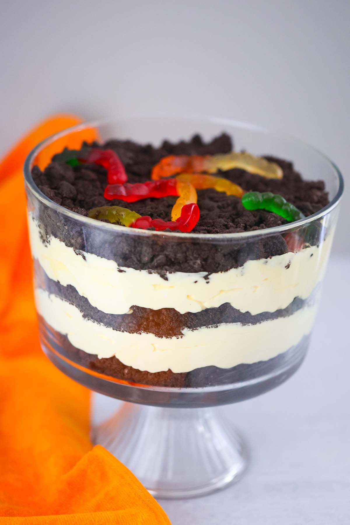 Oreo dirt cake in a glass trifle bowl. 