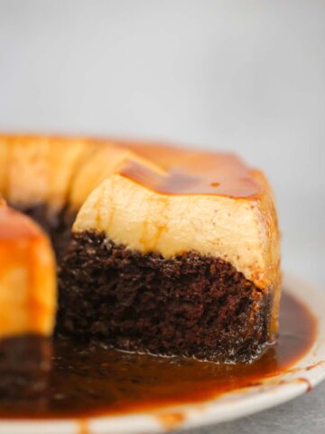 sliced chocoflan on a plate up close.